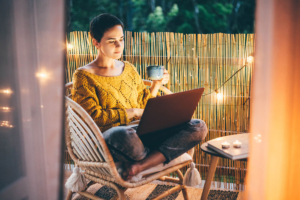 Woman learning on her laptop on home
